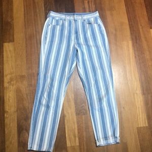 Blue and white American Eagle skinny jeans.